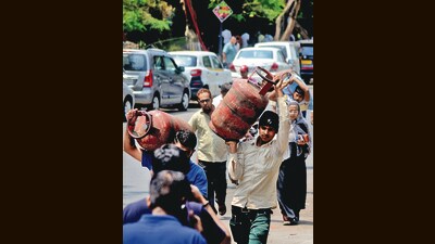 Despite government assurances, the panic buying of gas and fuel was still continuing with people swarming LPG refill centres and petrol pumps. Rumours are rife that a lockdown is imminent. (HT File)