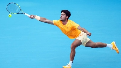 Carlos Alcaraz of Spain returns a shot against Sebastian Korda of the United States during Day 6 of the Miami Open at Hard Rock Stadium on March 22 (Getty Images via AFP) Carlos Alcaraz of Spain returns a shot against Sebastian Korda of the United States during Day 6 of the Miami Open at Hard Rock Stadium on March 22 (Getty Images via AFP)