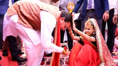 Uttarakhand Chief Minister Pushkar Singh Dhami during a mass kanya pujan programme at Sanatan Dharm Mandir in Prem Nagar, Dehradun, on Tuesday. The event was held during Chaitra Navratri and was attended by local public representatives and party functionaries. Uttarakhand Chief Minister Pushkar Singh Dhami during a mass kanya pujan programme at Sanatan Dharm Mandir in Prem Nagar, Dehradun, on Tuesday. The event was held during Chaitra Navratri and was attended by local public representatives and party functionaries.