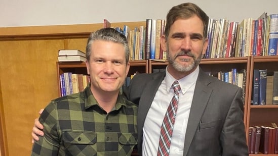 Defense Secretary Pete Hegseth seen with pastor Brooks Potteiger. (X/@fritzie4art)