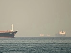 Cargo ships and tankers are seen off coast city of Fujairah, in the Strait of Hormuz in the northern Emirate.