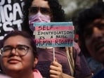 LGBTQIA+ community members hold placards during a protest demanding the withdrawal of the Transgender Amendment Bill 2026, in Mumbai, India, March 25, 2026. 