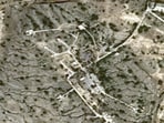 A satellite image shows damage on Kharg Island, Iran, after U.S. strikes, amid the U.S.-Israeli conflict with Iran, March 14, 2026. (SPOT © CNES 2026, Distribution Airbus DS/Handout via REUTERS)