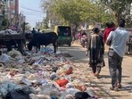Nearly 20% of sanitation workers have stopped reporting to work, citing steep increases in gas prices, according to officials. (Parveen Kumar/HT)