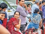 People queue up with empty cylinders for LPG cooking gas refills at Lokhandwala Township, Kandiavli, Mumbai, amid supply concerns triggered by the ongoing Iran–US conflict in Mumbai, India, on Wednesday, March 25, 2026. (Hindustan Times)