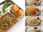 A section plate showing balanced portions of vegetables, rice, protein and dal, illustrating the simple visual method behind mindful eating.(AdobeStock)