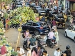 iMumbai, India - March 22, 2026: Hawkers line the busy roadside outside Vile Parle station, their colorful stalls and lively calls blending into the rhythm of the city’s daily rush in Mumbai, India, on Sunday, March 22, 2026. (Photo by Satish Bate/ Hindustan Times) (Hindustan Times)