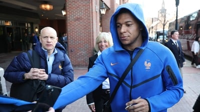 France's forward Kylian Mbappe signs autographs upon arriving at the hotel in Boston on March 24, 2026. (AFP) France's forward Kylian Mbappe signs autographs upon arriving at the hotel in Boston on March 24, 2026. (AFP)
