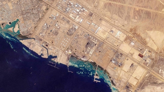 This satellite image shows the oil infrastructure at Saudi Arabia's western Red Sea port of Yanbu. Here, a network of pipes bisecting the Arabian peninsula connects the storage tanks, refineries and oil fields along the Gulf coast in the east to the Red Sea to the west. The plan to use this side, however, only works smoothly if Yemen's Houthis stay on the sidelines. (Planet Labs PBC/AFP)