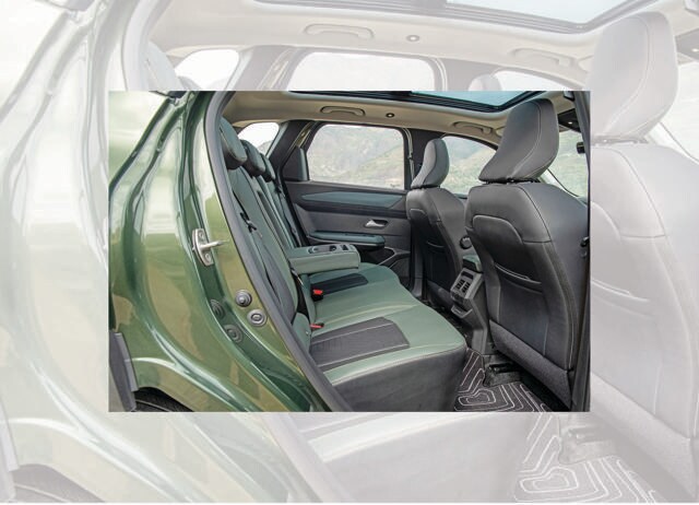The rear bench is comfortable for two adults, with good headroom and enough knee room. The rear bench is comfortable for two adults, with good headroom and enough knee room.