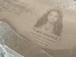 A sand portrait of Hind Rajab, a 5-year-old Palestinian girl killed in Gaza in 2024 and the focus of the Oscar-nominated film 'The Voice of Hind Rajab', created on a beach near Scarborough, North Yorkshire, Britain. 