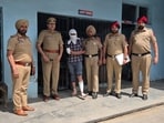 Following his arrest, the accused allegedly attempted to escape custody by jumping from a room, and injured his right arm and feet, said police. (HT)