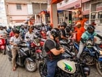 Consumers gather at a petrol station amid rumours of fuel shortages due to the war in West Asia, in Guwahati, Thursday, March 26, 2026. India has about 60 days of fuel stock cover, the government said on Thursday, adding that there is no shortage of petrol, diesel, or LPG as it dismissed reports of shortages as a "deliberate misinformation campaign" aimed at triggering panic buying.
