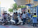Rush at Petrol pump in college road due to panic buying in Ludhiana. (Gurpreet/HT)