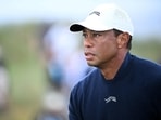 US golfer Tiger Woods reacts after driving from the 4th tee during his second round, on day two of the 152nd British Open Golf Championship 