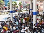 Vehicles at a petrol pump in Prayagraj on Thursday. (ANI PHOTO)