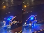 Viral clip showed Dubai Police helping stranded pedestrians amid heavy rain, earning praise online.