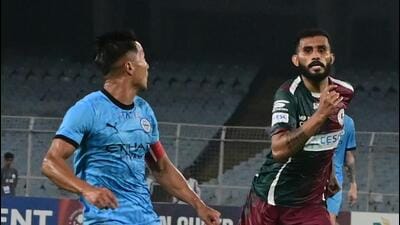 Players vie for a ball during the Indian Super League (ISL) match between Mumbai City FC and Mohun Bagan Super Giant, at Salt Lake Stadium in Kolkata. (PTI) Players vie for a ball during the Indian Super League (ISL) match between Mumbai City FC and Mohun Bagan Super Giant, at Salt Lake Stadium in Kolkata. (PTI)