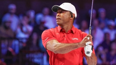 Tiger Woods of the Jupiter Links Golf Club plays his shot from the second tee the TGL finals golf tournament in Palm Beach Gardens (AP) Tiger Woods of the Jupiter Links Golf Club plays his shot from the second tee the TGL finals golf tournament in Palm Beach Gardens (AP)