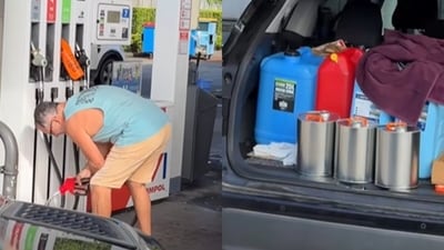 Viral video showed a motorist hoarding petrol at an Australia service station. (Facebook/ Willem Powerfish) Viral video showed a motorist hoarding petrol at an Australia service station. (Facebook/ Willem Powerfish)