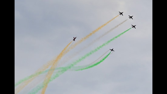 The Surya Kiran Aerobatic team performing an air show at Sukhna Lake in Chandigarh on Friday. (Ravi Kumar/HT)