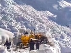 A snow-cutter blower clears snow following multiple avalanches that hit the Srinagar-Leh national highway near Zoji La pass. (PTI)