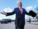 President Donald Trump speaks to reporters after stepping off Air Force One, Friday, March 27, 2026, at Miami International Airport in Miami.