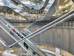 At Paris’s Villejuif-Gustave Roussy, a 230-ft-wide cylindrical shaft topped with glass directs sunlight all the way down. (Dominique Perrault Architects)