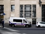 A policeman stands alongside police and private security vehicles outside The Bank of America building in the 8th arrondissement of Paris on March 28, 2026. A policeman stands alongside police and private security vehicles outside The Bank of America building in the 8th arrondissement of Paris on March 28, 2026.