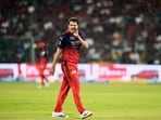 Jacob Duffy sets his field as he prepares to bowl a delivery during the IPL 2026 match 1.