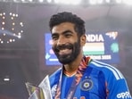 India's Jasprit Bumrah holds the tournament trophy during celebrations after India won the ICC Men's T20 World Cup 2026 at Narendra Modi Stadium, in Ahmedabad. (PTI)