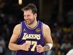 Luka Doncic #77 of the Los Angeles Lakers celebrates after a basket against the Indiana Pacers at Gainbridge Fieldhouse Luka Doncic #77 of the Los Angeles Lakers celebrates after a basket against the Indiana Pacers at Gainbridge Fieldhouse