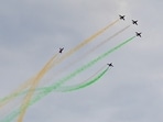 The Surya Kiran Aerobatic team performing an air show at Sukhna Lake in Chandigarh on Friday. (Ravi Kumar/HT)