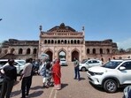 Vehicles parked in front of a Lucknow landmark, obscuring the view (HT Photo)