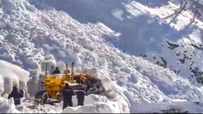 A snow-cutter blower clears snow following multiple avalanches that hit the Srinagar-Leh national highway near Zoji La pass. (PTI) A snow-cutter blower clears snow following multiple avalanches that hit the Srinagar-Leh national highway near Zoji La pass. (PTI)