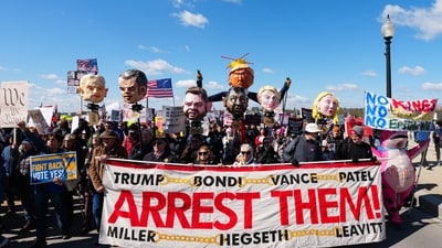 Demonstrators hold effigies of US President Trump and Trump administration officials while marching during the "No Kings" national day of protest near the Memorial Bridge in Washington, DC, on March 28, 2026. (Photo by Aaron Schwartz / AFP) (AFP) Demonstrators hold effigies of US President Trump and Trump administration officials while marching during the "No Kings" national day of protest near the Memorial Bridge in Washington, DC, on March 28, 2026. (Photo by Aaron Schwartz / AFP) (AFP)