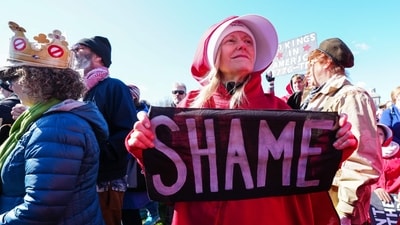 Demonstrators march along the National Mall during the "No Kings" national day of protest in Washington, DC, on March 28, 2026. It is the third time in less than a year that Americans will take to the streets as part of a grassroots movement called "No Kings," the most vocal and visual conduit for opposition to Trump since he began his second term in January 2025. (Photo by Aaron Schwartz / AFP) (AFP) Demonstrators march along the National Mall during the "No Kings" national day of protest in Washington, DC, on March 28, 2026. It is the third time in less than a year that Americans will take to the streets as part of a grassroots movement called "No Kings," the most vocal and visual conduit for opposition to Trump since he began his second term in January 2025. (Photo by Aaron Schwartz / AFP) (AFP)