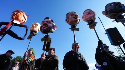 Demonstrators hold effigies of US President Trump and Trump administration officials while marching during the "No Kings" national day of protest near the Memorial Bridge in Washington, DC, on March 28, 2026. Nationwide protests against US President Donald Trump are expected Saturday as millions of people vent fury over what they see as his authoritarian bent and other forms of cruel, law-trampling governance. It is the third time in less than a year that Americans will take to the streets as part of a grassroots movement called "No Kings," the most vocal and visual conduit for opposition to Trump since he began his second term in January 2025. (Photo by Aaron Schwartz / AFP) (AFP) Demonstrators hold effigies of US President Trump and Trump administration officials while marching during the "No Kings" national day of protest near the Memorial Bridge in Washington, DC, on March 28, 2026. Nationwide protests against US President Donald Trump are expected Saturday as millions of people vent fury over what they see as his authoritarian bent and other forms of cruel, law-trampling governance. It is the third time in less than a year that Americans will take to the streets as part of a grassroots movement called "No Kings," the most vocal and visual conduit for opposition to Trump since he began his second term in January 2025. (Photo by Aaron Schwartz / AFP) (AFP)