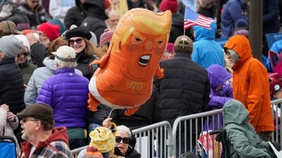 An inflatable balloon depicting U.S. President Donald Trump hovers during a "No Kings" protest against Trump's administration policies, in St. Paul, Minnesota, March 28, 2026. REUTERS/Tim Evans (REUTERS)
