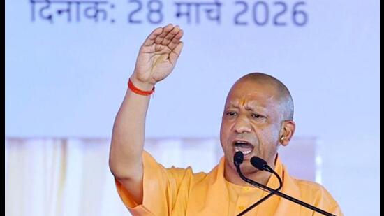 Uttar Pradesh chief minister Yogi Adityanath addresses a gathering on the occasion of the inauguration of the Noida International Airport, in Jewar on Saturday. (ANI PHOTO)