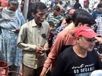 Long queue of LPG consumers outside a gas agency in Prayagraj (Anil Kumar Maurya/HT)