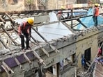 Mumbai, India. Mar 27, 2026 - The Mumbai Metropolitan Region Development Authority (MMRDA) began demolishing the Laxmi Niwas building near Prabhadevi Railway Station after residents were rehabilitated, as it falls within the alignment of the new Sewree-Worli bridge. Mumbai, India. Mar 27, 2026. (Photo by Raju Shinde/HT Photo) (Raju Shinde)