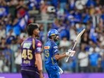Mumbai Indians' Rohit Sharma celebrates his half century during an Indian Premier League (IPL) 2026 T20 cricket match between Mumbai Indians and Kolkata Knight Riders
