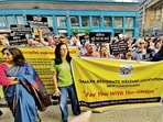 Protesters highlighted unrestricted access to the township, poor CCTV coverage, inadequate security, incomplete dwelling units, and the presence of stray dogs. (HT Photo)
