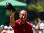 Tiger Woods of the U.S. acknowledges the crowd on the green on the 18th hole after completing his final round
