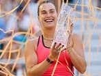 World No.1 Aryna Sabalenka of Belarus with the trophy after beating American Coco Gauff in the women's singles final of the Miami Open on Saturday. (AFP)