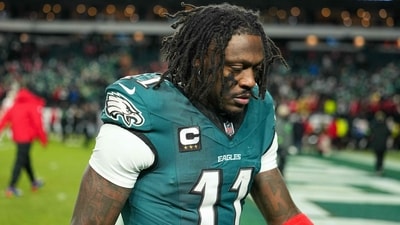 PHILADELPHIA, PENNSYLVANIA - JANUARY 11: A.J. Brown #11 of the Philadelphia Eagles walks off the field after his team's 23-19 loss against the San Francisco 49ers in the NFC Wild Card Playoff game at Lincoln Financial Field on January 11, 2026 in Philadelphia, Pennsylvania.   Mitchell Leff/Getty Images/AFP (Photo by Mitchell Leff / GETTY IMAGES NORTH AMERICA / Getty Images via AFP) (Getty Images via AFP)