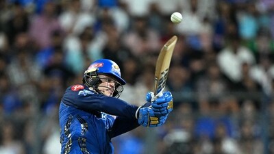 Ryan Rickelton was the keeper chosen over his countryman Quinton de Kock, and he repaid the faith of the MI team. With 8 sixes to his name, Rickelton raced away to 81(43), being run-out late in the chase before Mumbai saw it through with five balls to spare. (AFP) Ryan Rickelton was the keeper chosen over his countryman Quinton de Kock, and he repaid the faith of the MI team. With 8 sixes to his name, Rickelton raced away to 81(43), being run-out late in the chase before Mumbai saw it through with five balls to spare. (AFP)