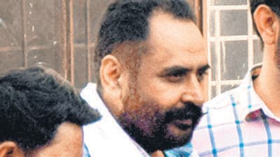Harmeet Singh Pathanmajra, 50, a first-time legislator from the Sanaur constituency of Patiala district, had been on the run since September 2 last year in connection with a rape and cheating case. (Ajay Sharma) Harmeet Singh Pathanmajra, 50, a first-time legislator from the Sanaur constituency of Patiala district, had been on the run since September 2 last year in connection with a rape and cheating case. (Ajay Sharma)