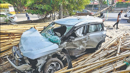 Mangled remains of Porsche that crashed into a Brezza near GD Goenka School, Pitampura, on Sunday. (Sanjeev Verma/HT Photo)